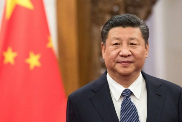 China's President Xi says global governance system should be more equitable, fair
