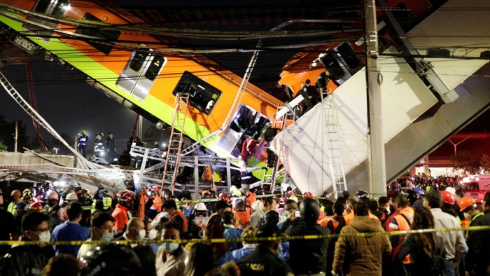 Mexico City rail overpass collapses onto road, killing at least 23
