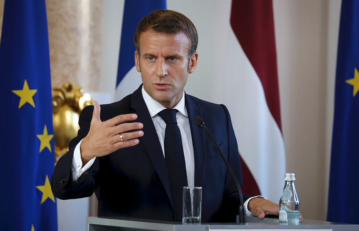 Macron: France to delay sanctions as UK talks continue
