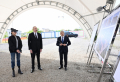Президент Ильхам Алиев и первая леди Мехрибан Алиева приняли участие в церемонии закладки фундамента третьего жилого комплекса в Шуше ОБНОВЛЕНО