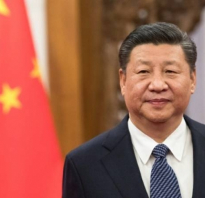China's President Xi says global governance system should be more equitable, fair

