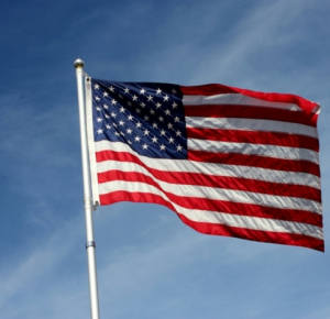 Fed holds interest rates near zero, sees faster growth and higher inflation